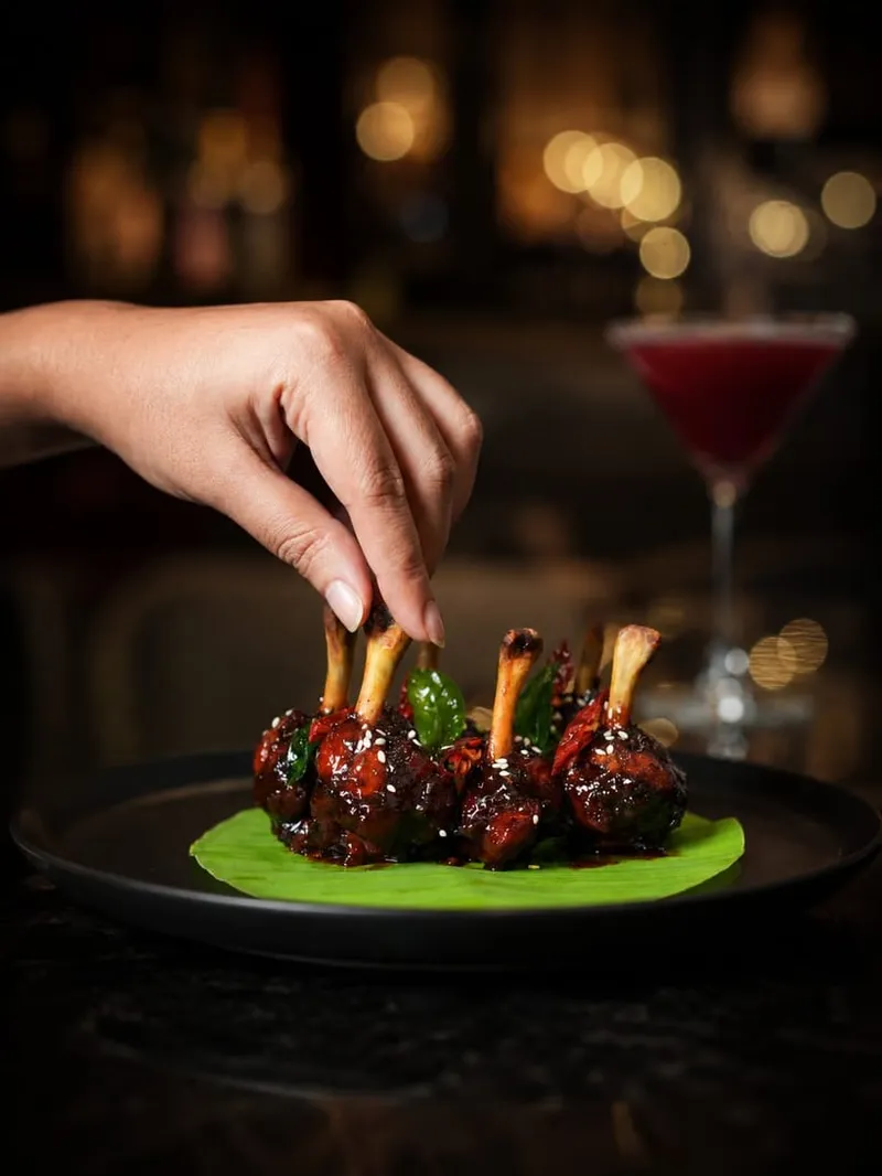 Inji Puli Chicken being garnished