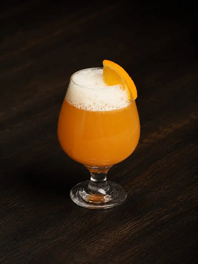 Spiced raw-mango drink in a glass