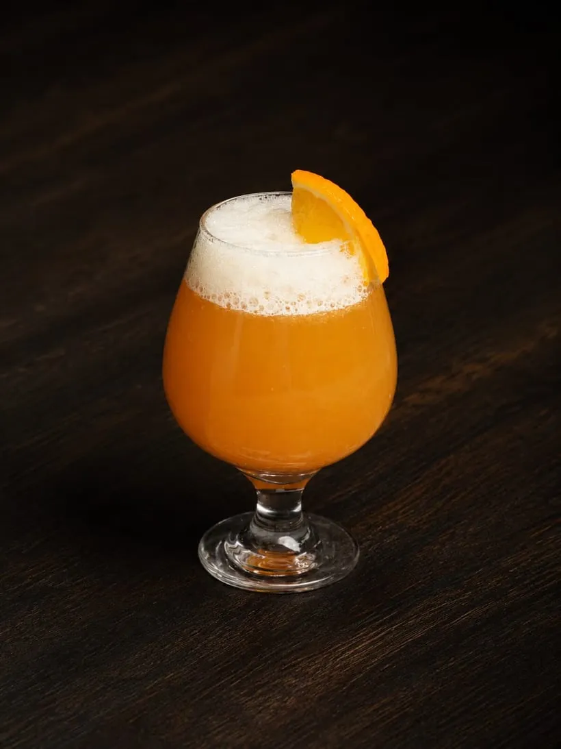 Spiced raw-mango drink in a glass