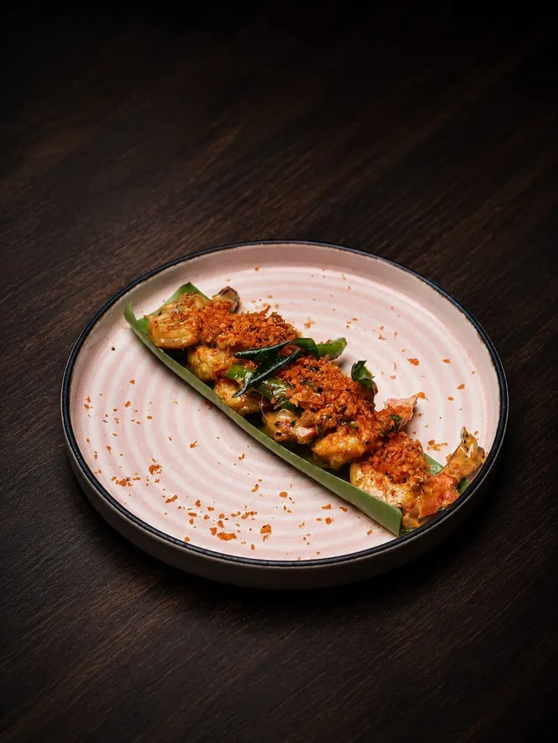Venad Paal Konju on a banana leaf strip