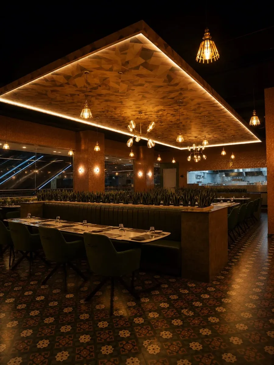 Long dining room with warm ceiling lights